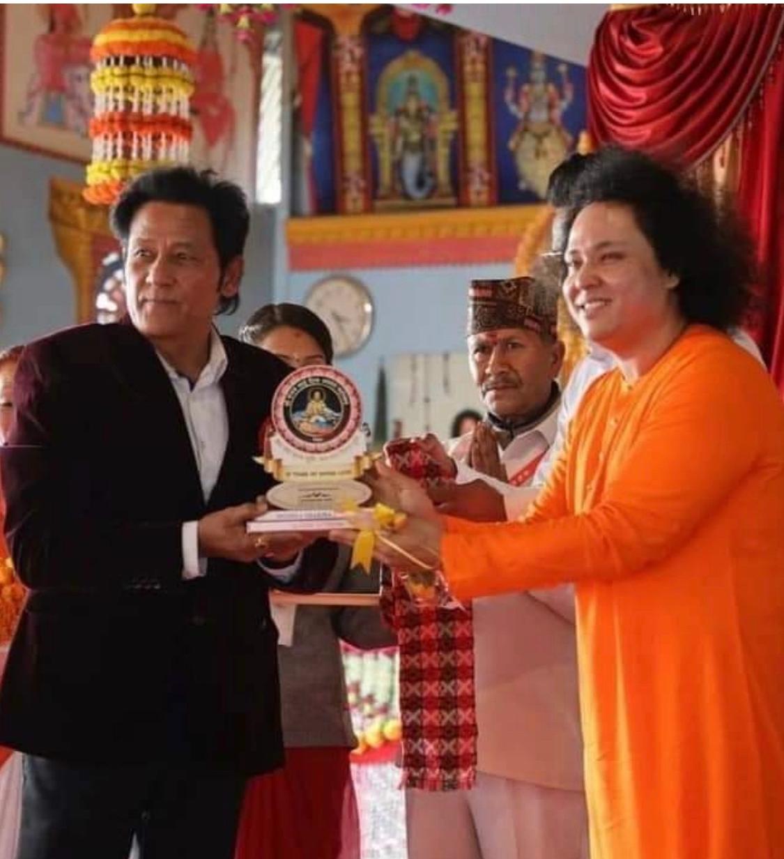 Shiva Shrestha with community members